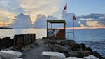 Sonnenaufgang hinter Wolken an der Wasserskistation, la Favire